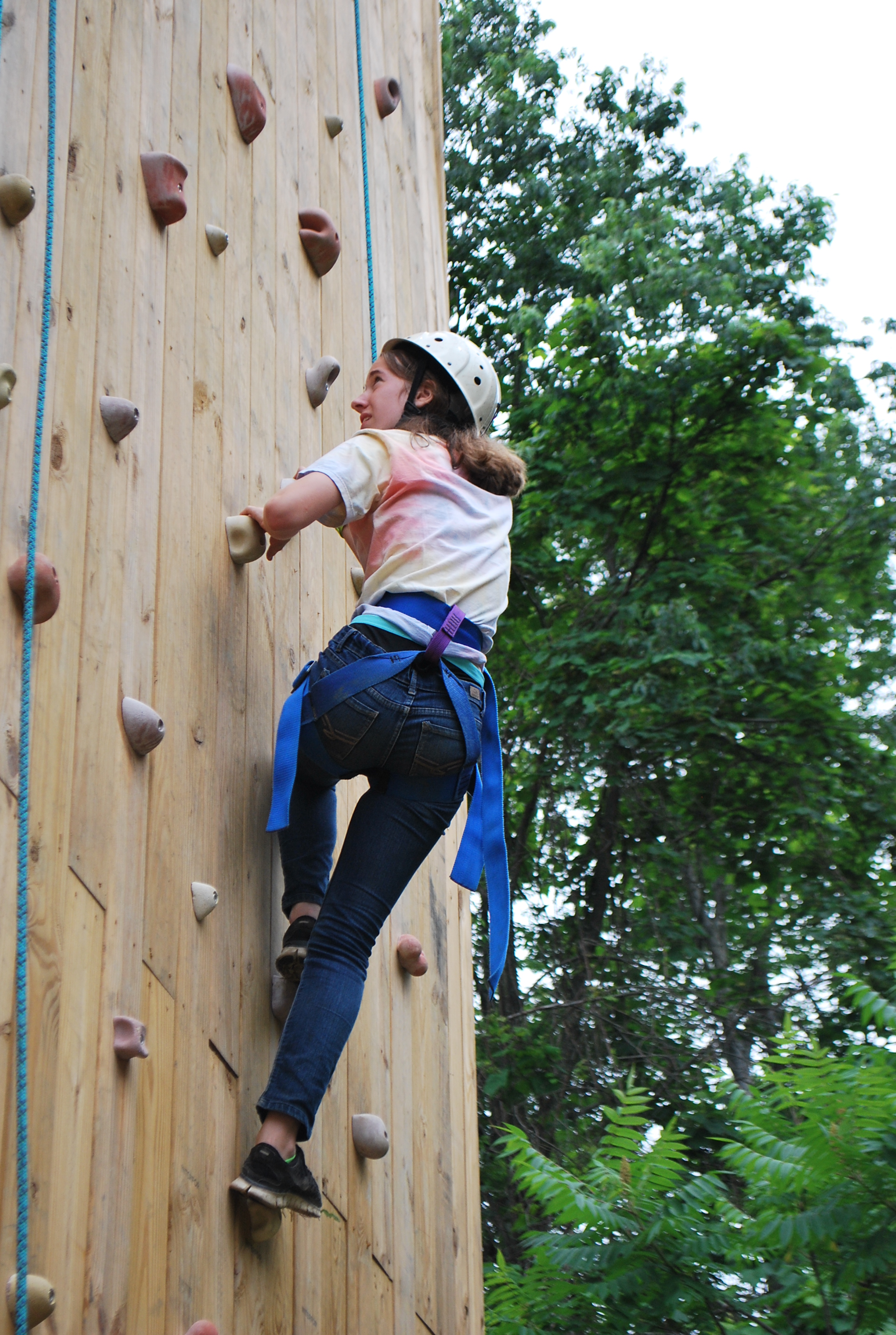 Camper climbing the rockwall.
