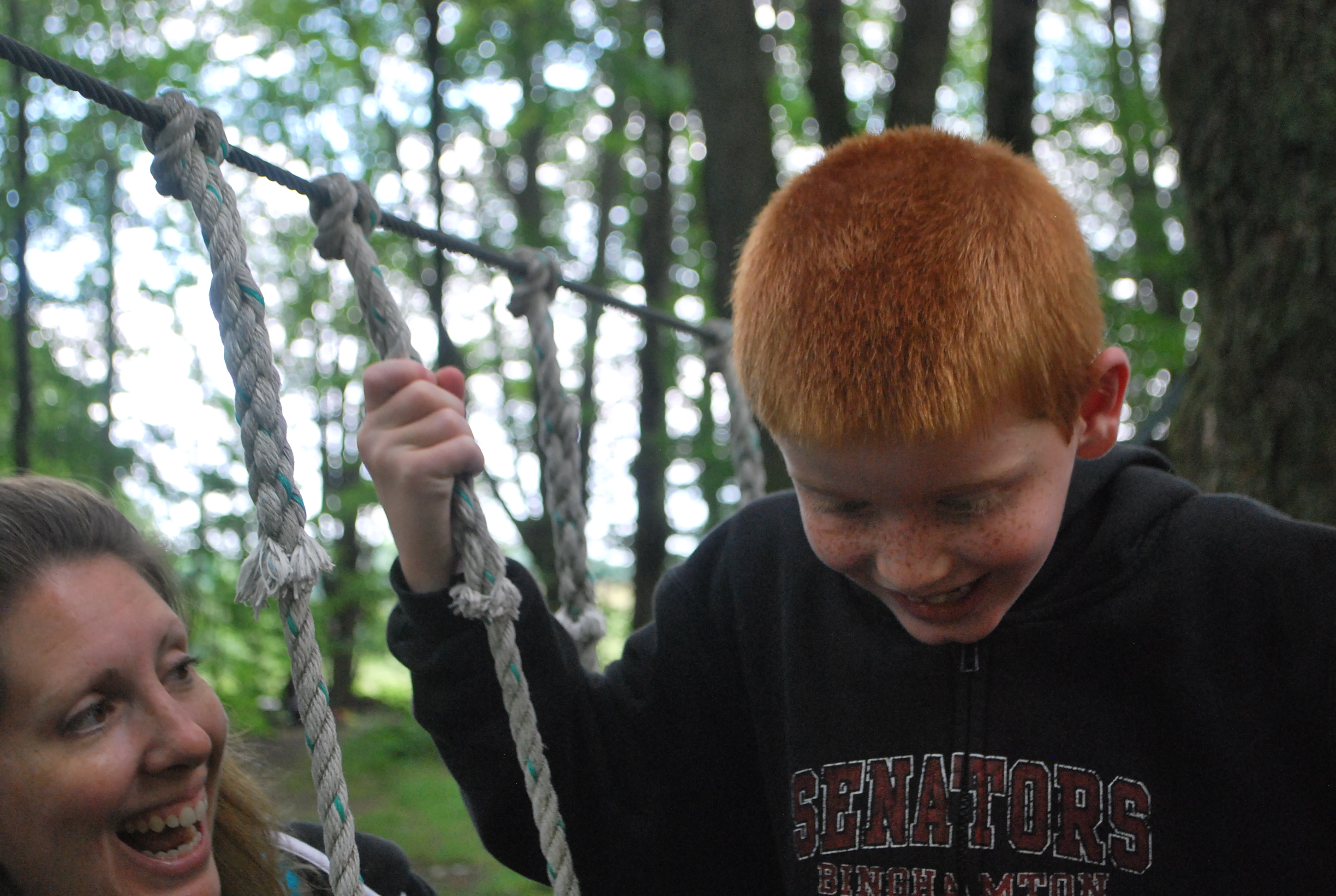 ABC Camper on the rope course with his mom